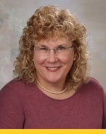 Paula Kensler, DNP, MBA, RN, Program Director for the Clinical Nurse Leader Master’s and Executive Nurse Leader Doctor of Nursing Practice (DNP) programs and Instructor of Clinical Nursing, is pictured in a headshot.